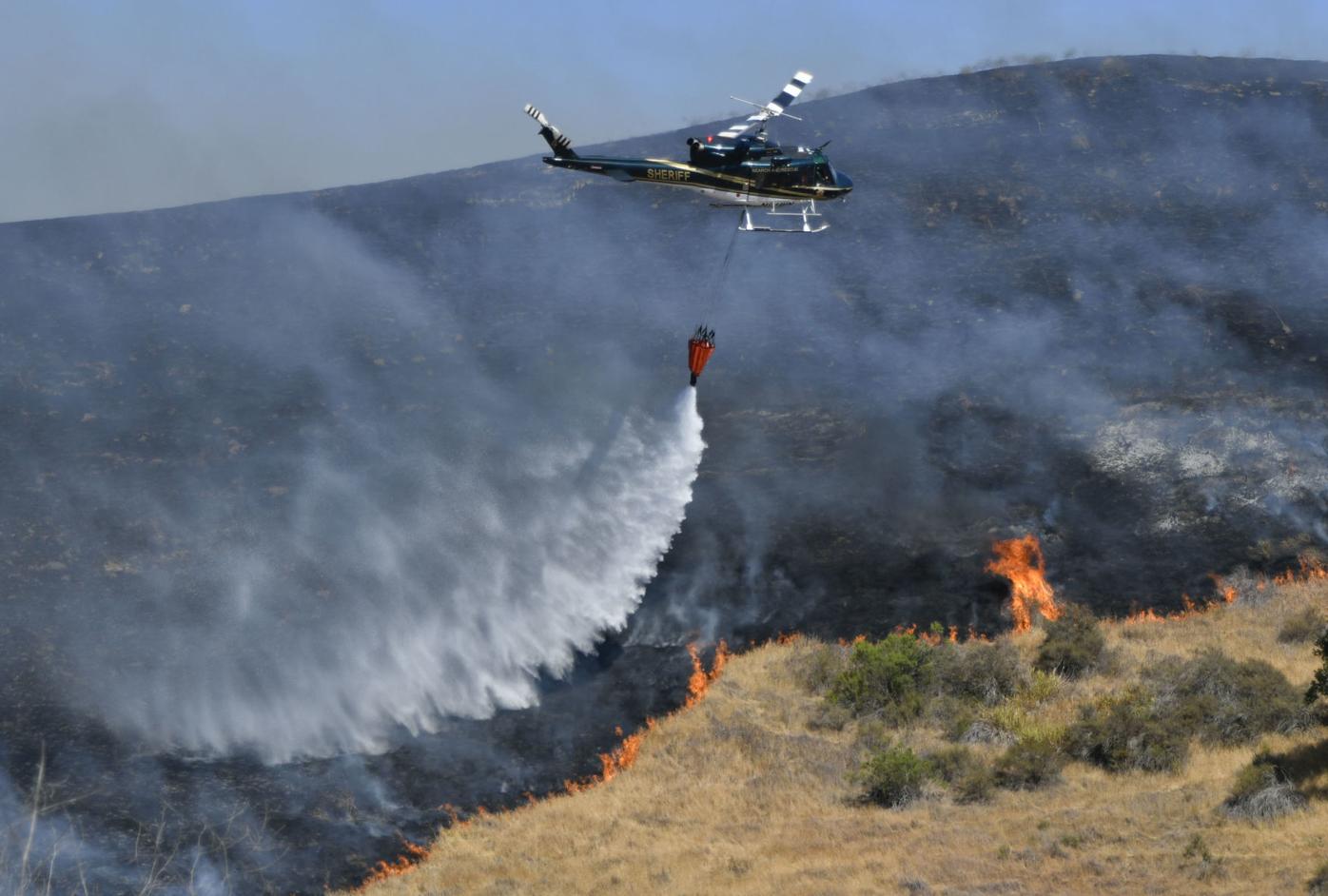 Crews maintain steady hold over Windmill fire; full containment