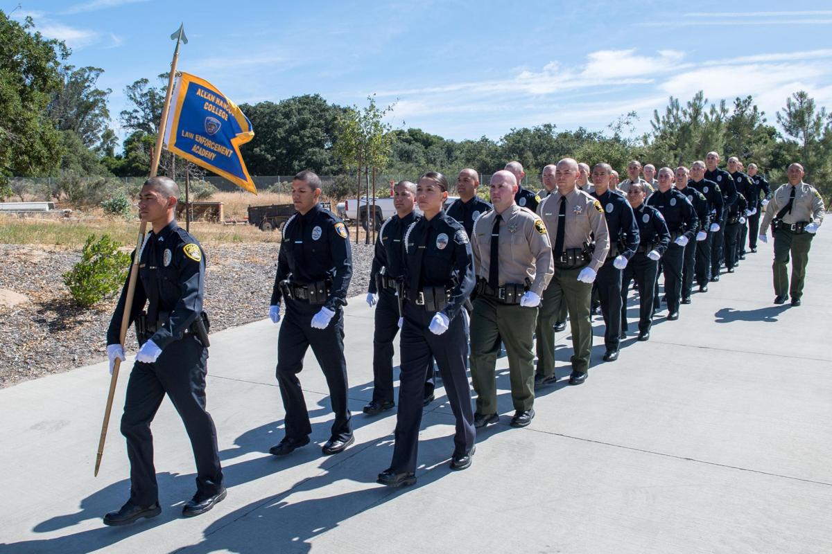 Hancock Law Enforcement Academy graduates 27 recruits Local News