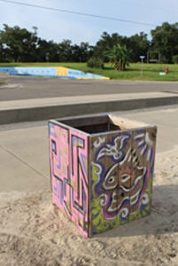 Bringing Art to the Beach: Members of The Arts, Hancock County contribute to Trash Barrel Community Art project
