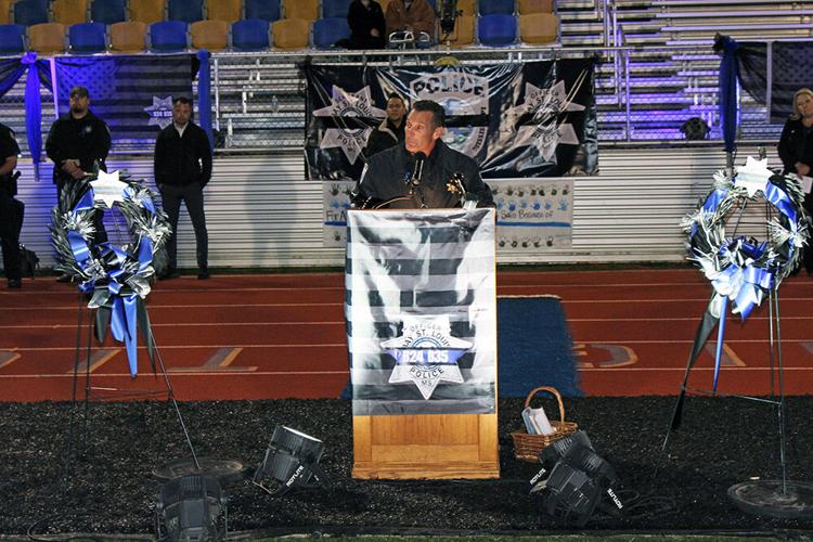 Community mourns fallen officers at candlelight vigil | News ...
