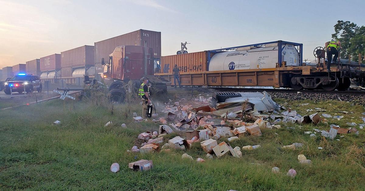 Train strikes stuck truck spilling condiments along Highway 78 | Alert ...