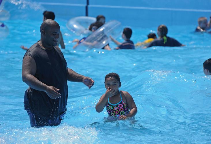 Residents turn out for wave pool opening in Seguin News