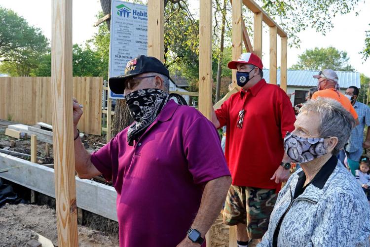 Habitat raises wall on 31st home, ‘House That Gloria Built’ News