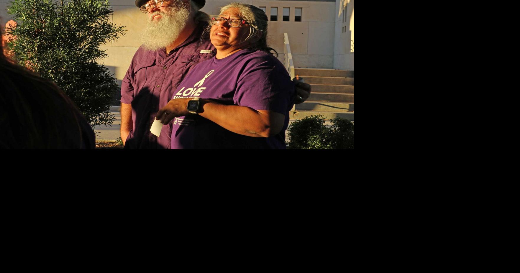 Community shines light on domestic violence at vigil | News ...