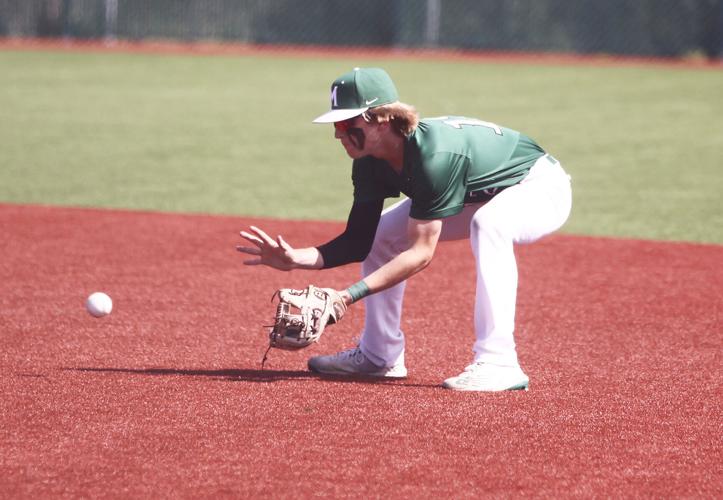 Marion closes district with 122 victory over Randolph Sports