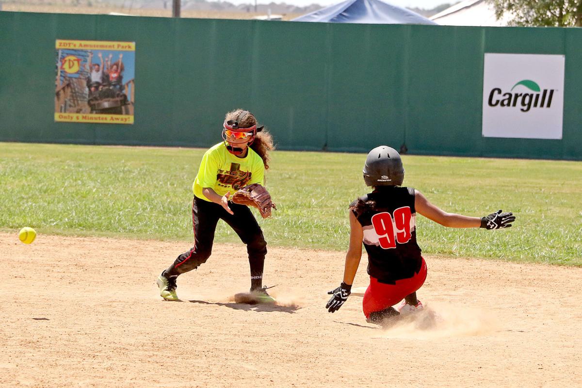 INTERNATIONAL AFFAIR Softball tournament brought teams across borders