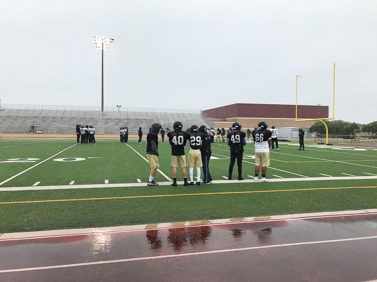 Seguin football faces Austin McCallum during a cold, rainy week