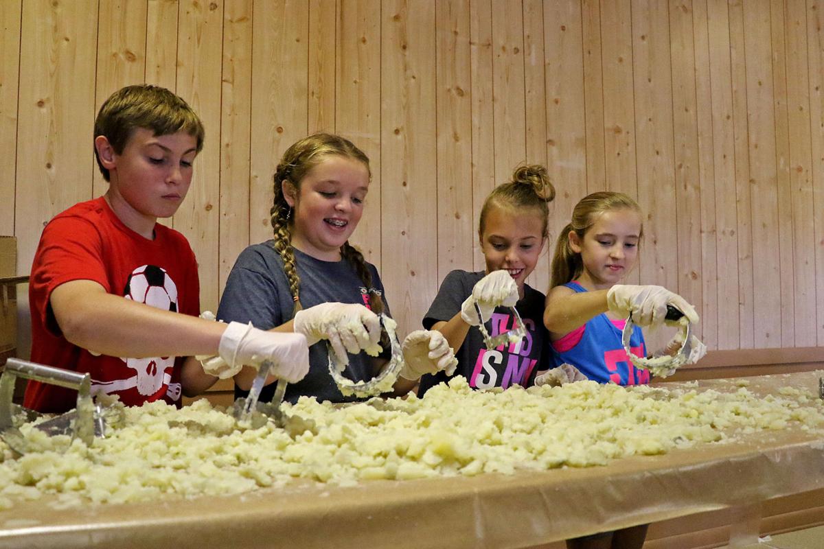 Community comes together for sausage festival News