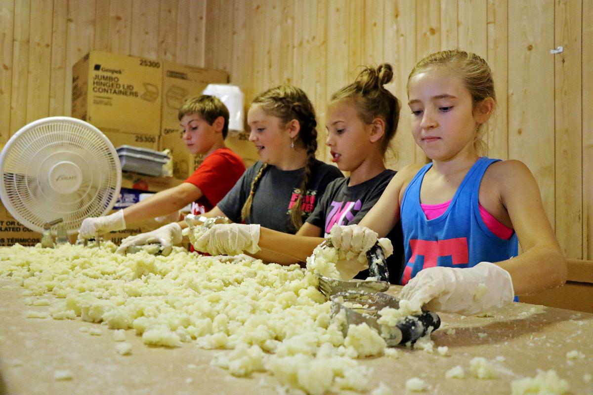 Community comes together for sausage festival News