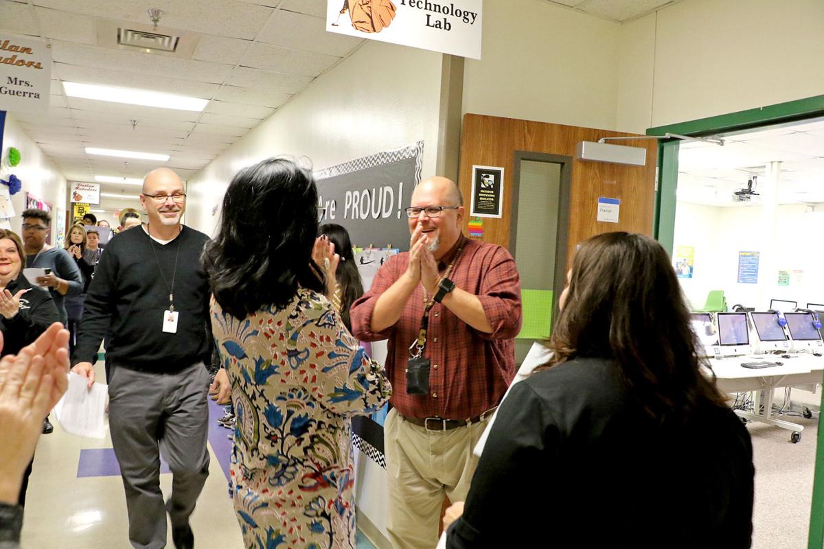 Seguin teachers greeted with giant grant checks News