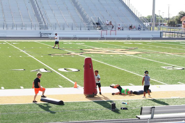 Seguin football coaches, parents enjoy as players listen, learn
