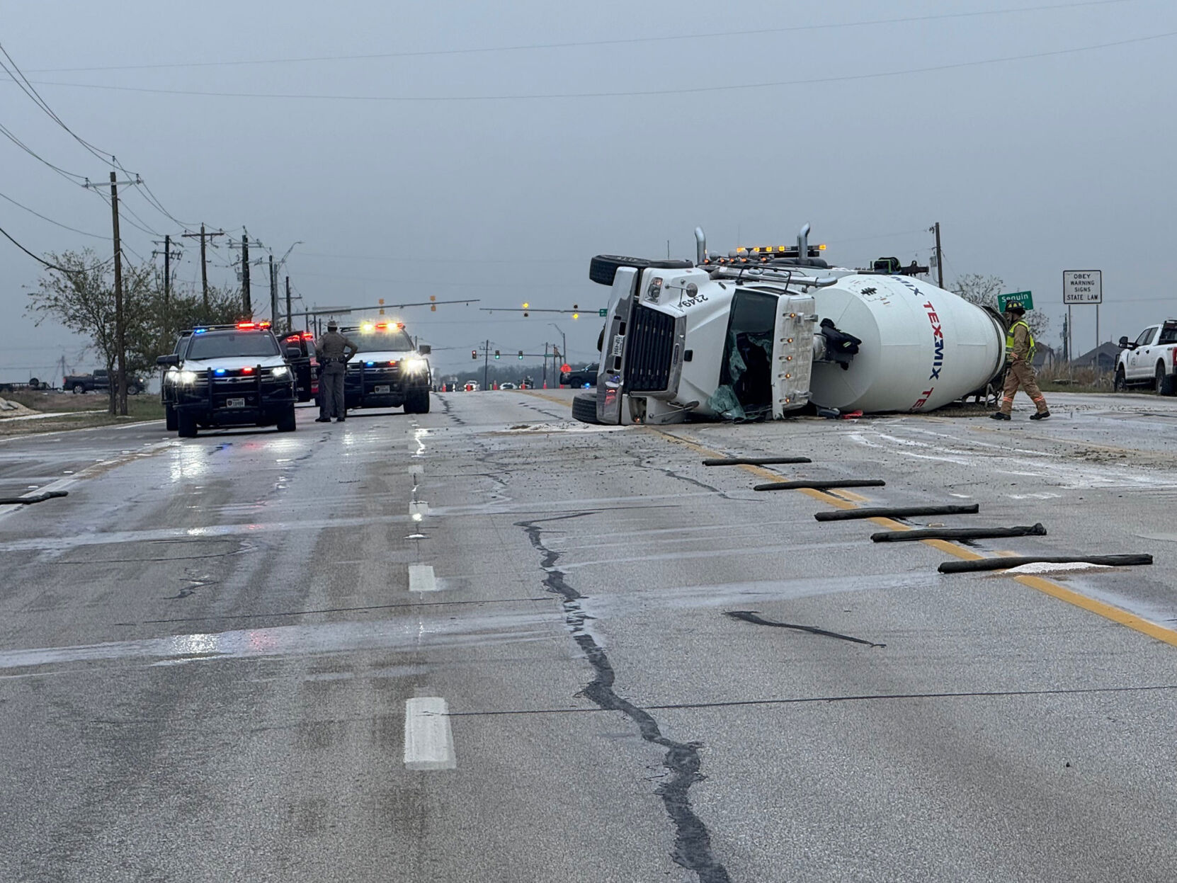 Overturned cement truck halts traffic on State Highway 46 near Seguin ...