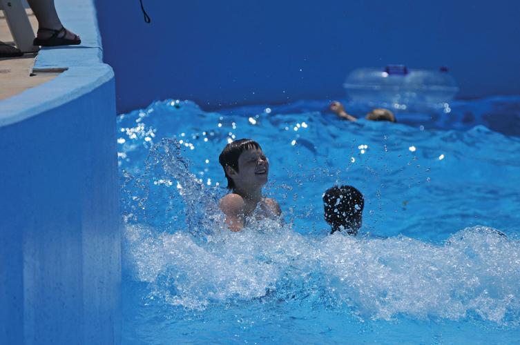 Residents turn out for wave pool opening in Seguin News