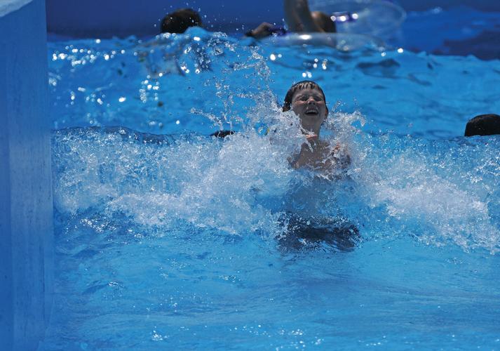 Residents turn out for wave pool opening in Seguin News