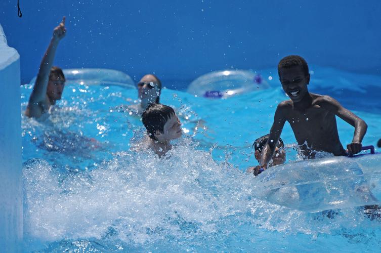 Residents turn out for wave pool opening in Seguin News