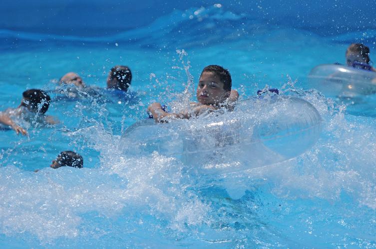Residents turn out for wave pool opening in Seguin News