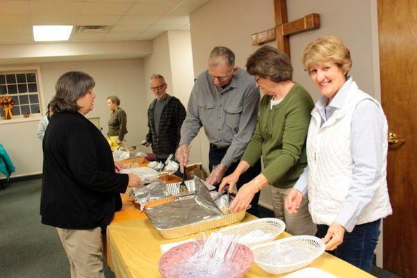 In the season of thanksgiving: Community gives through community dinner, food baskets