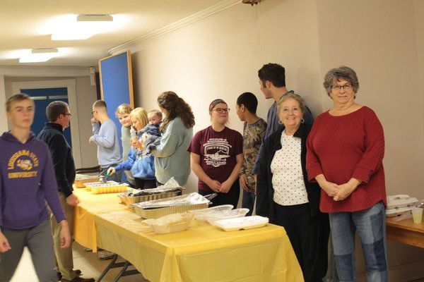 In the season of thanksgiving: Community gives through community dinner, food baskets