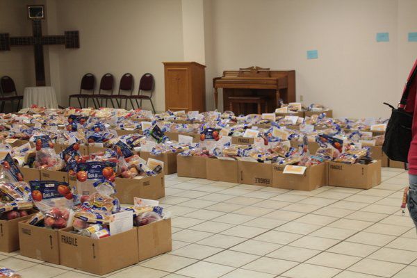 In the season of thanksgiving: Community gives through community dinner, food baskets