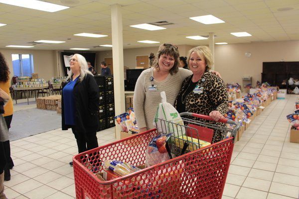 In the season of thanksgiving: Community gives through community dinner, food baskets