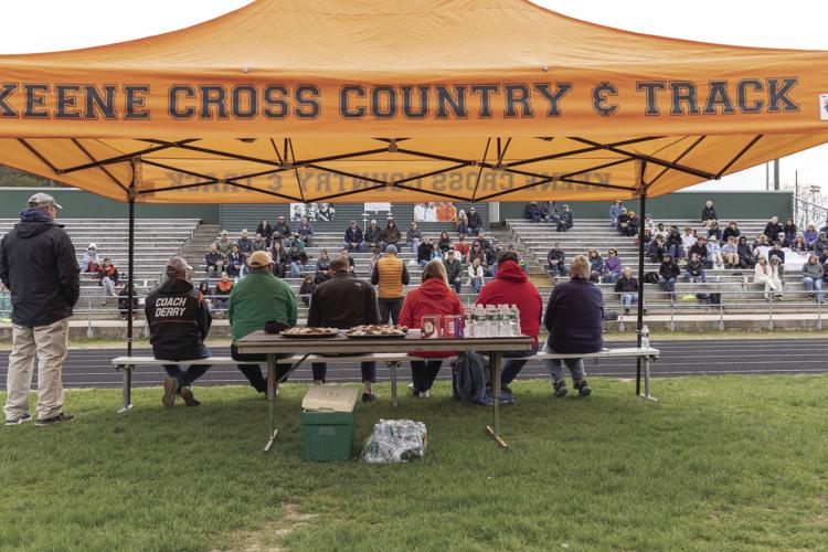 Tent lettered with Keene Cross Country & Track set up at track renaming ceremony