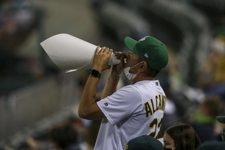PHOTOS: Fans return to Oakland Coliseum to cheer on A's, Archives