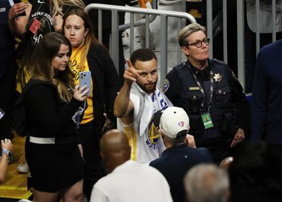 Warriors Stephen Curry No. 30 walks off the court at the end of game 5
