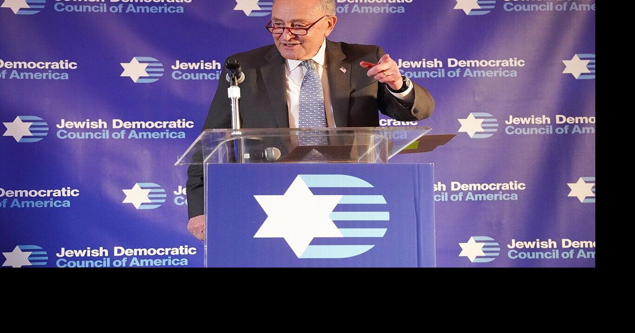 A spurned Schumer reaches out to the left