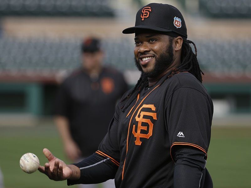 Johnny Cueto (and his orange-tinted dreads) fits right in with Giants, Sports