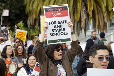 Teachers on a citywide strike in front of Mission High School