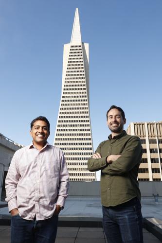 Sachin Agarwal (left) and Steven Bacio, co-founders of Grow SF at their office in San Francisco with a view of the Transamerica Pyramid