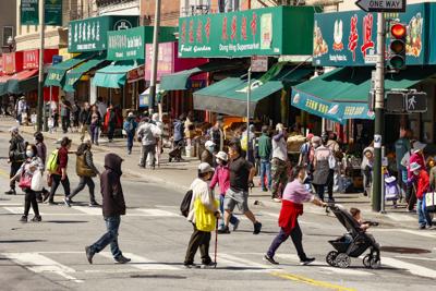 People out grocery shopping on Stockton Street in Chinatown
