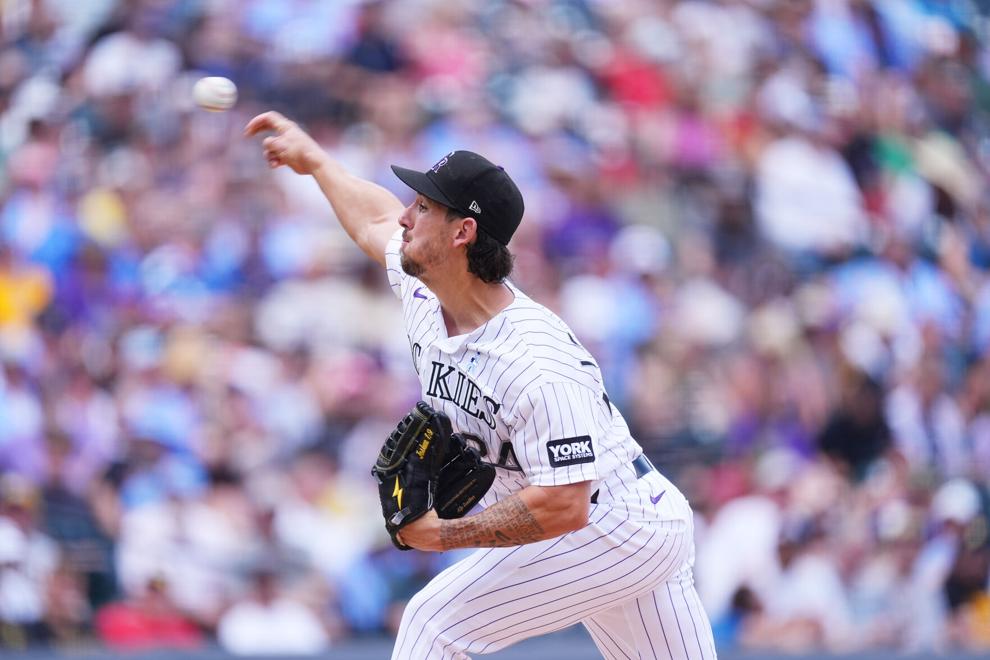 Gonzalez and Reynolds homer as the Pirates hold off the Rockies, 8-6