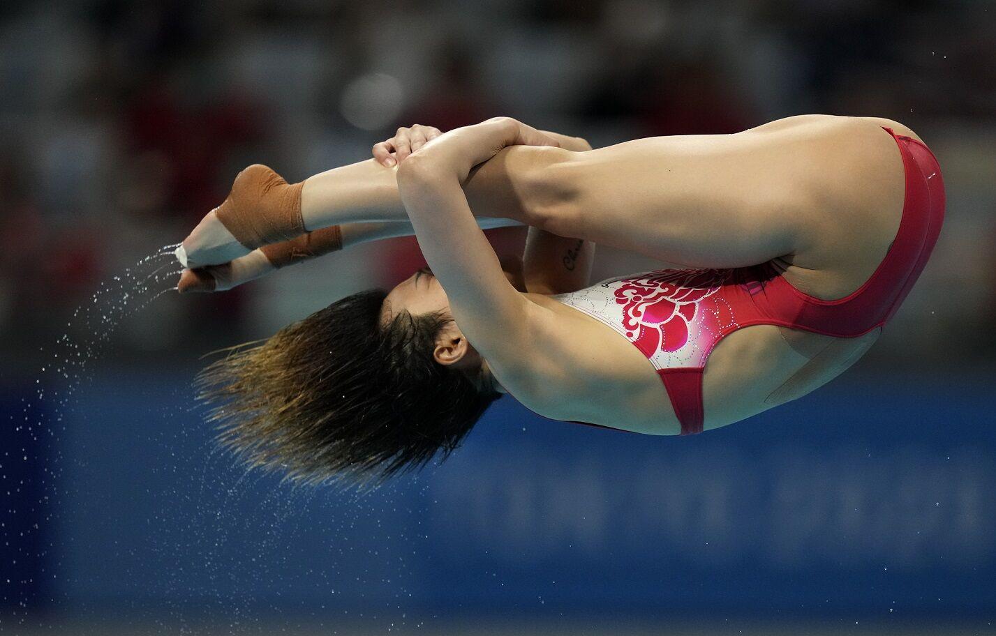 Shi Tingmao of China completes Olympic 3meter diving sweep Sports