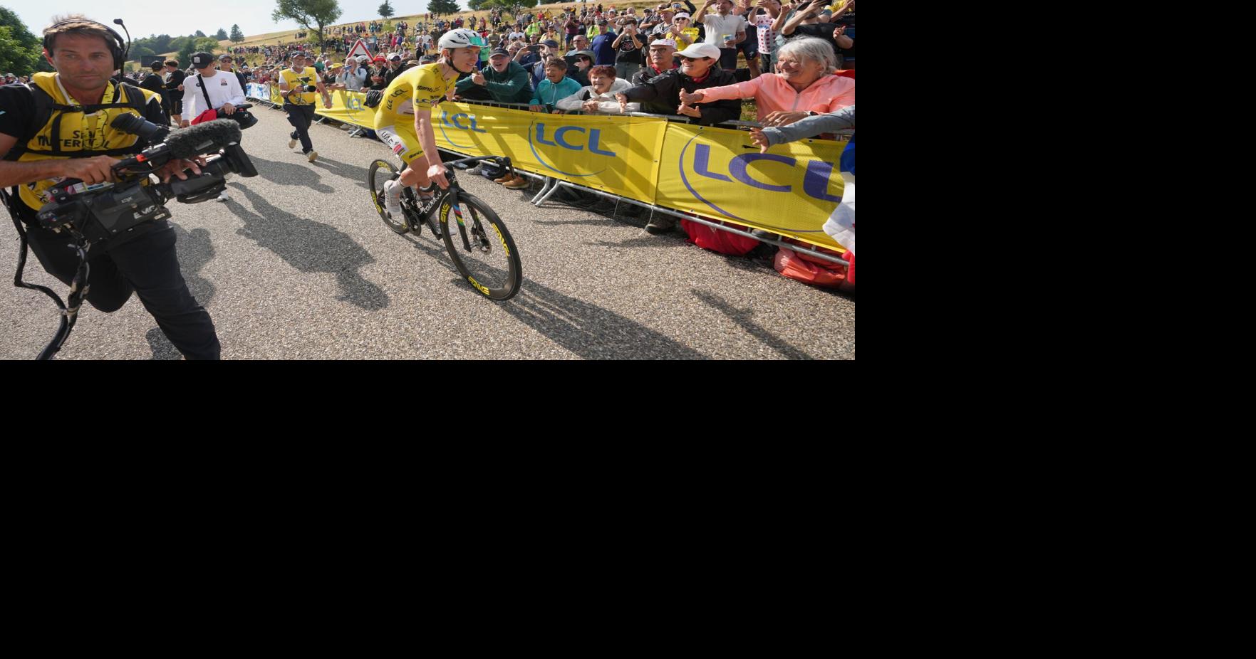 Pogacar attacks in the final climb to win 14th stage of the Tour de France and increases overall lead