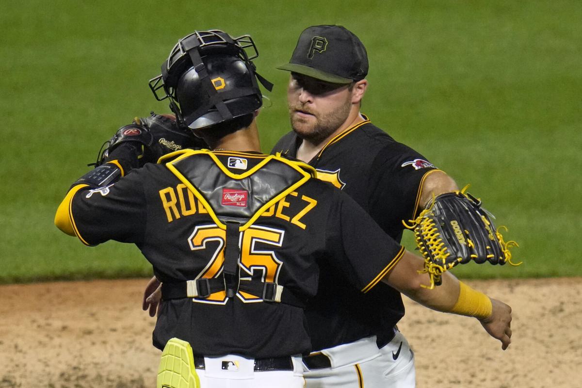 Connor Joe leaves game after being hit in left hand by pitch as Pirates  lose to Braves