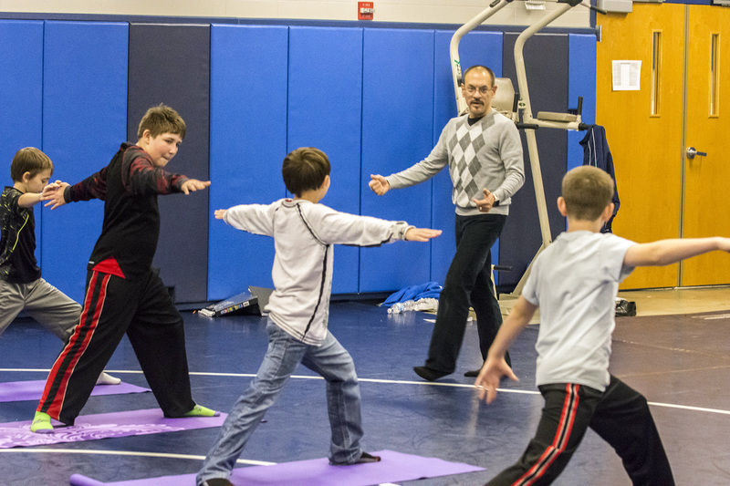 Connecting body and mind: Yoga gives middle-schoolers a sense of ...