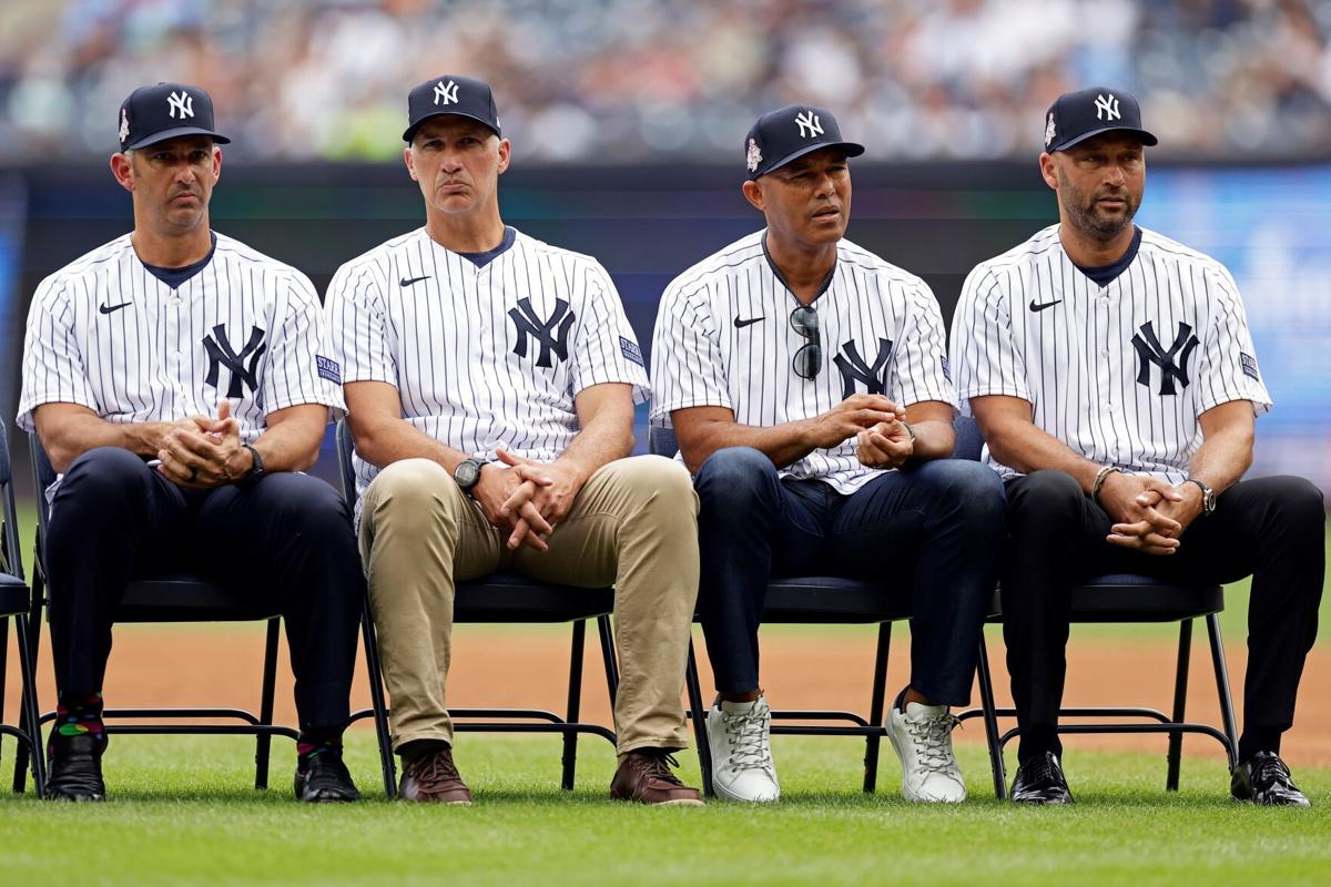 Former New York Yankees players, including Mariano Rivera, center