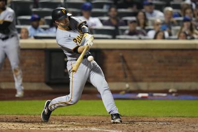 Delay's 2-run double in 6-run 7th sparks Pirates over Mets 7-4