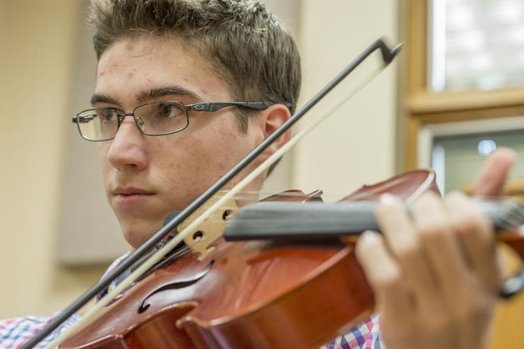 String fling: Hickory student playing at All-Eastern music festival |  Community 