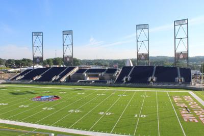 Tom Benson now has a stadium named after him, with a statue