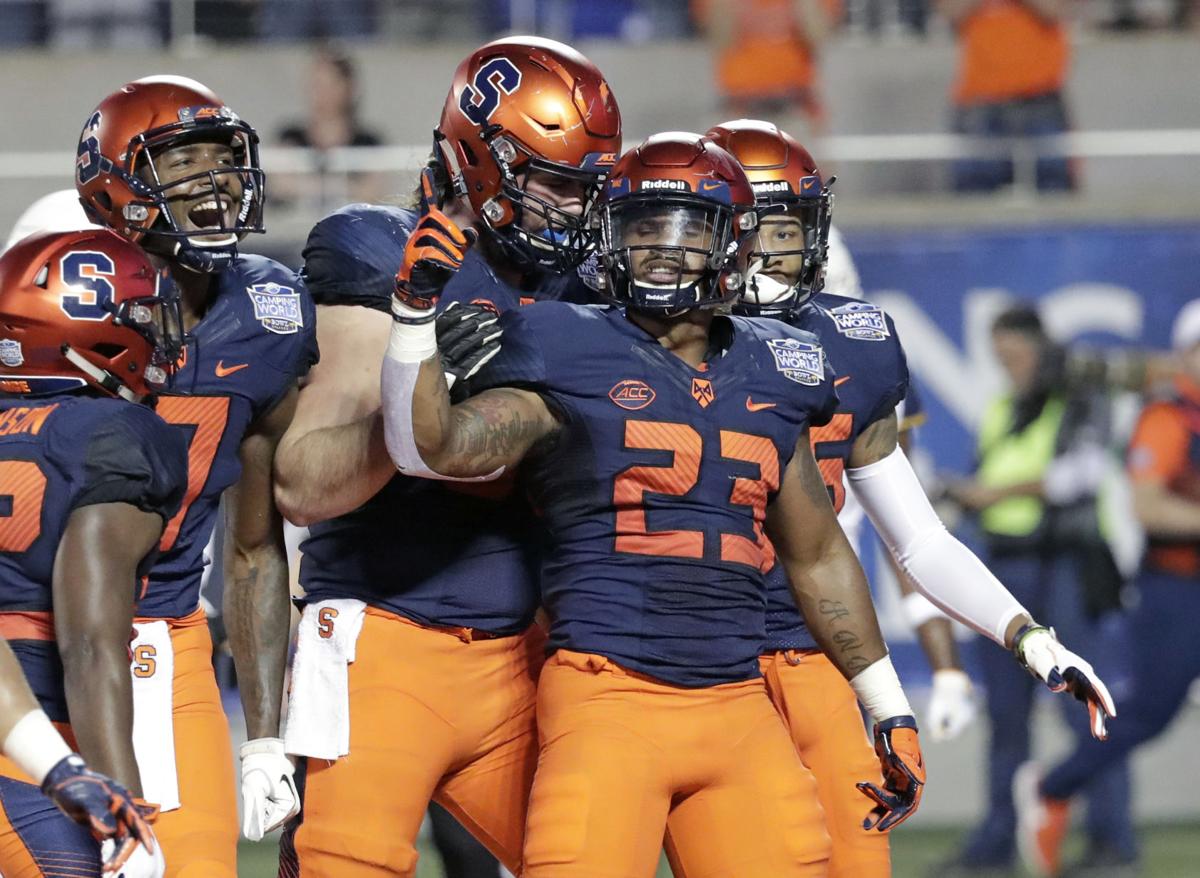 Syracuse Rolls Past Wvu 34 18 In Camping World Bowl Sports