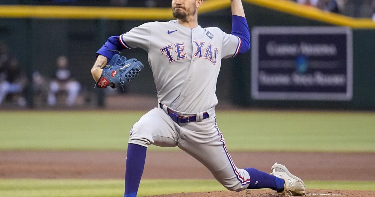 Heaney opts in for $13M to stay with Rangers, and World Series champs ...