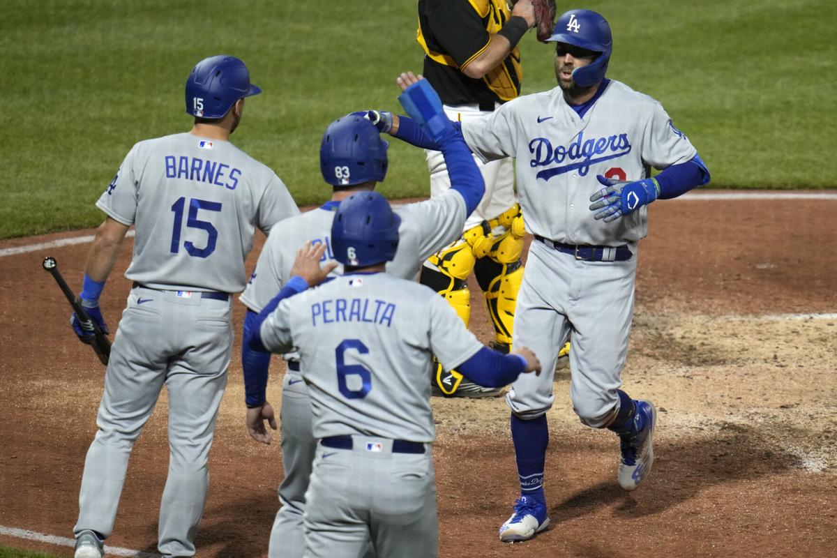 Peralta, Dodgers come back for 2-1 win over Cubs