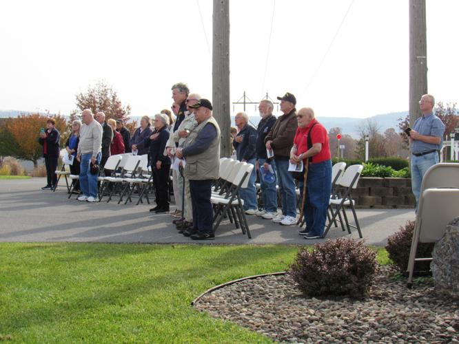 Land of the free WWII Veterans Richard Smith, Edgar Huffner raise the