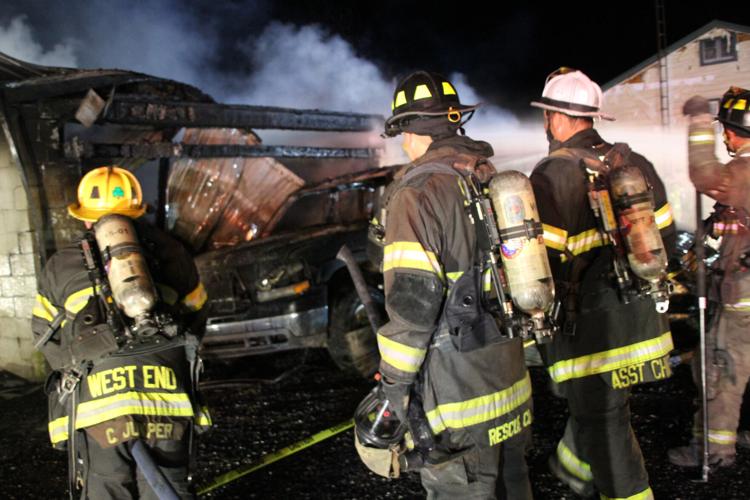 Firefighters issue Mayday call while responding to garage fire | Local ...