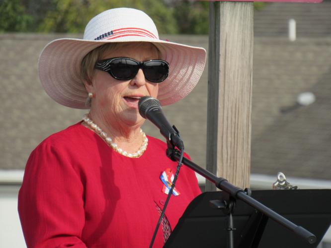 Land of the free WWII Veterans Richard Smith, Edgar Huffner raise the