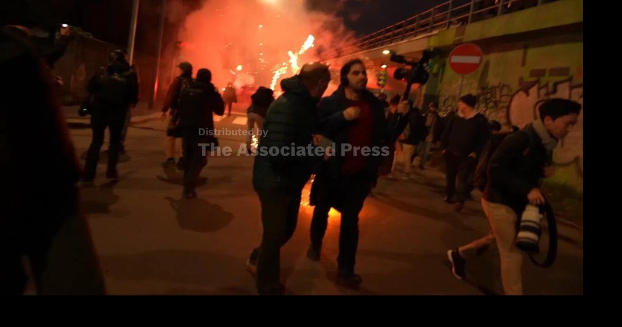Italian police fire tear gas as protesters clash near Winter Olympics hockey venue
