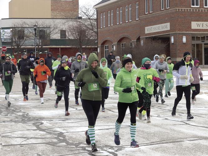 Runners brave 18-degree temperatures, gusty winds during Irish Jig