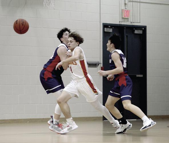 Mason County Eastern boys basketball runs past Cadillac Heritage Christian  | Ludington Daily News | shorelinemedia.net